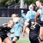 Rick Ross/Peninsula College Athletics
Peninsula College's Lauren Lases heads the ball while surrounded by a host of Columbia Basin defenders and teammate Gemma Rowland during the Pirates' 3-0 win over the Hawks at the NWAC Friendlies in Tukwila.
