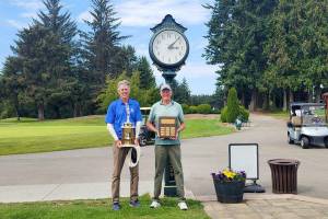 The Cedars at Dungeness Men’s Club champions are four-time defending Gross champ Jeff Jones, left, and Rick Towery (Net).