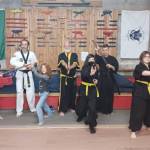 Master Alan Lindwall (in black, rear), head instructor for Seibu Ryu sword school of Iai-battojitsu of Seattle, spent Saturday at White Crane Martial Arts in downtown Port Angeles, teaching a seminar of the Japanese sword arts to the Gumdo class that practices the Korean sword arts with Grandmaster Robert Nicholls (black and gold trim, rear). The class is held at 5 p.m. Tuesdays at the dojang. (Courtesy photo)