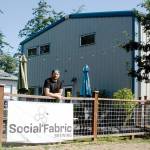 Brewery owner Levi Liberty in the beer garden at Social Fabric Brewing in Port Townsend on Tuesday. (Elijah Sussman/Peninsula Daily News)