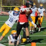 Neah Bays Jodell Wimberley runs for a touchdown against Wellpinit in the state playoffs in 2022 in Forks. Wimberley, who rushed for 1,839 yards last year, is back for the Red Devils. (Lonnie Archibald/for Peninsula Daily News)