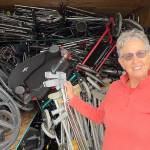 Rosalie DiMaggio looks to bring in at least another 40 wheelchairs to total about 150 and ship them along with walkers, canes and other medical gear to Guatemala to help people with mobility challenges. (Matthew Nash/Olympic Peninsula News Group)