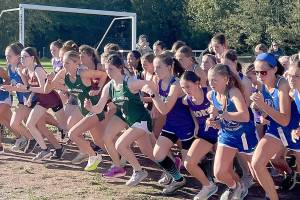 Port Angeles Cross Country Girls competitors begin the Olympic League Opener cross country race at Kingston High School on Wednesday. (Port Angeles Cross Country)