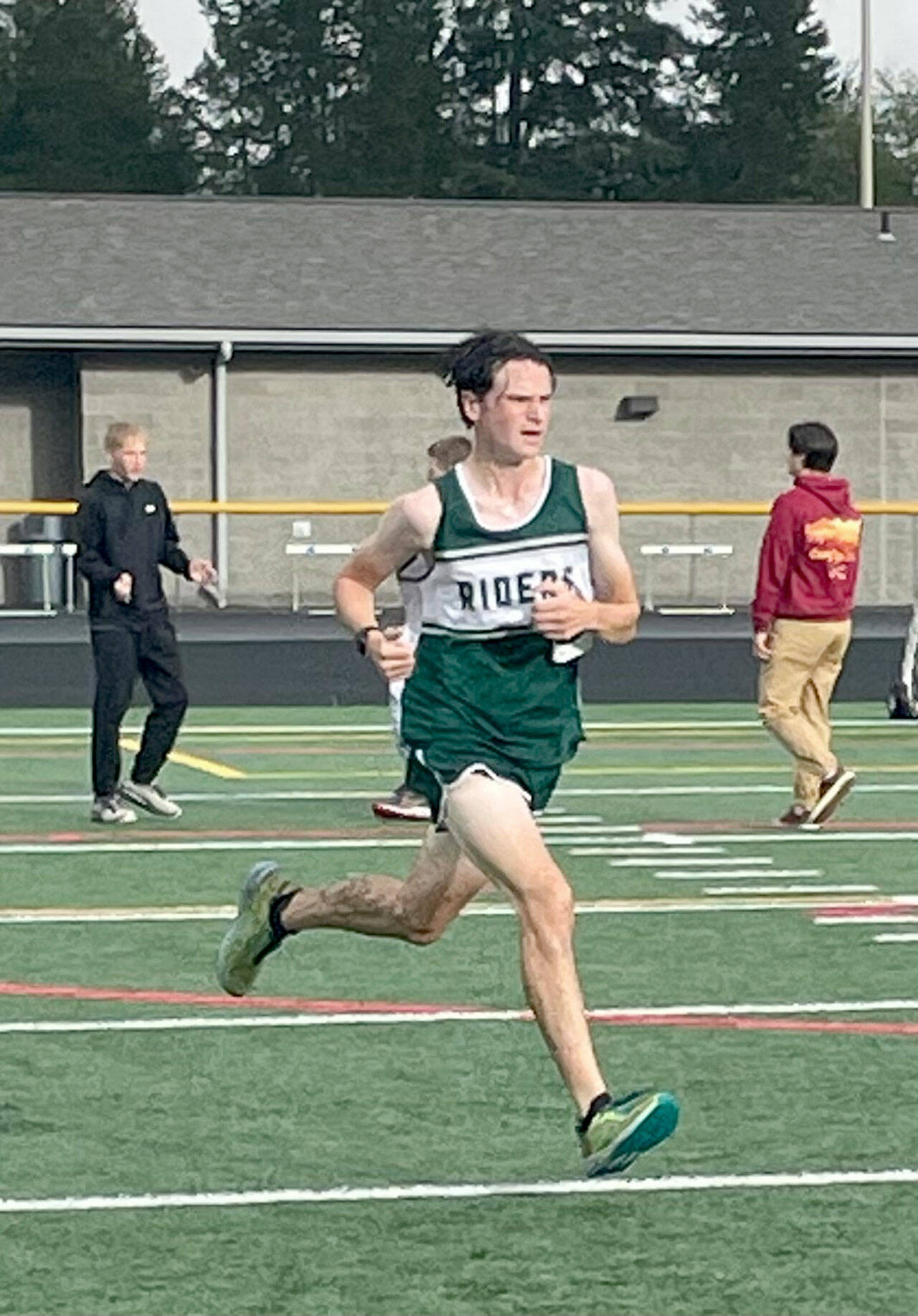 Port Angeles Cross Country Port Angeles Andre Campbell nears the end of the Olympic League No. 1 cross country meet Wednesday at North Mason High School.
Port Angeles Cross Country Port Angeles Andre Campbell nears the end of the Olympic League No. 1 cross country meet Wednesday at North Mason High School.