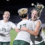 Michael Dashiell/Olympic Peninsula News Group
Port Angeles' Lilly Anne Lancaster, right, hugs teammate Ava-Anne Sheahan after scoring the game-winning goal in double overtime in the Riders' 3-2 win over rival Sequim on Thursday.