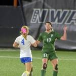 KEITH THORPE/PENINSULA DAILY NEWS Port Angeles Ava-Anne Sheahan, right, takes the header as Bremertons Melanie Uhrich closes in on Tuesday night in Port Angeles.