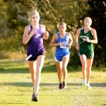 Michael Dashiell/Olympic Peninsula News Group
Sequims Dawn Hulstedt runs ahead of Olympics Brynn Fulton and Port Angeles Leia Larson during the Olympic League cross country meet at Voice of America at the Dungeness Recreation Area on Wednesday.