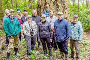 State and local officials toured Dabob Bay forests in 2022. Back row, left to right, Mary Jean Ryan of Quilcene; Rachel Bollens; Bill Taylor, Taylor Shellfish Co.; Jeromy Sullivan, Port Gamble SKlallam Tribe; Justin Allegro, The Nature Conservancy; and Greg Brotherton, Jefferson County Commissioner. Front row, left to right, Duane Emmons, DNR staff; Jean Ball of Quilcene; Hilary Franz, state Commissioner of Public Lands; Mike Chapman, state Representative; and Peter Bahls, director of Northwest Watershed Institute. (Keith Lazelle)