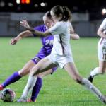 Sequim's Sasha Yada (20) battles for a ball against a Kingston player on Tuesday in Sequim. Kingston won the match 3-2 in penalty kicks. (Michael Dashiell/Olympic Peninsula News Group)