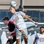 Jay Cline/for Peninsula College Athletics
Peninsula's Nil Grau leaps for a header in front of a Skagit Valley opponent as teammate Edwin Diaz looks on during the Pirates' 2-1 victory over the Cardinals on Wednesday at Wally Sigmar Field.