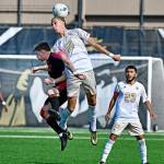 Jay Cline/for Peninsula College Athletics Peninsulas Nil Grau leaps for a header in front of a Skagit Valley opponent as teammate Edwin Diaz looks on during the Pirates 2-1 victory over the Cardinals on Wednesday at Wally Sigmar Field.