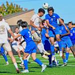 Peninsula Colleges Jem Ndja goes up for a header in a game Saturday at Wally Sigmar Field against Edmonds College. Peninsula won 7-0. (Jay Cline/Peninsula College)