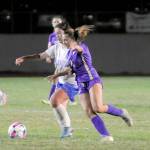 Sequims Ruby Moxley-Horgan, right, jockeys for position during the Wolves 5-0 win over Olympic at home on Thursday. (Matthew Nash/Olympic Peninsula News Group)