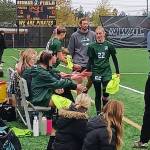 Pierre LaBossiere/Peninsula Daily News
Port Angeles Teanna Clark is congratulated by her teammates after she scored on a penalty kick against Franklin Pierce in the Roughriders district playoff victory Saturday at Wally Sigmar Field.