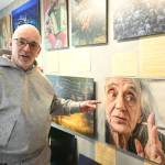Sequim photographer Randy Tomaras points to a photo featured in his two-volume course It Is NOT the Camera. Tomaras home studio will be featured in the Strait from the Artists Studio Tour today and Sunday. (Michael Dashiell/Olympic Peninsula News Group)
