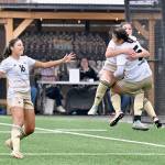 Peninsula College women's soccer players Desiree Dutra (No. 16), Ellise Maffeo and Risa Nishida (No. 5) all celebrate Maffeo's goal at the end of the first half in the NWAC quarterfinals Saturday at Wally Sigmar Field. Maffeo's goal was the only score of the game in a 1-0 Peninsula win. (Jay Cline/Peninsula College)
