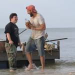 Zak (Zack Gottsagen) and Tyler (Shia Labeouf) near the raft they built together to travel by water. (Port Townsend Film Festival)