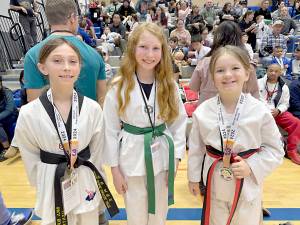 White Crane Martial Arts Inka Burke, Zae Kasten and Maisie Chistison all won medals this weekend at the Washington State Taekwondo Masters Union Presidents Cup tournament in Federal Way. (White Crane Martial Arts)