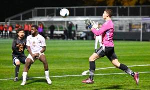Jay Cline/for Peninsula College Athletics Peninsula goalkeeper Laurin Lettow eyes the ball as he prepares to field the ball during the Pirates 1-0 NWAC Mens Soccer Semifinal win over Walla Walla on Friday at Starfire Sports in Tukwila.