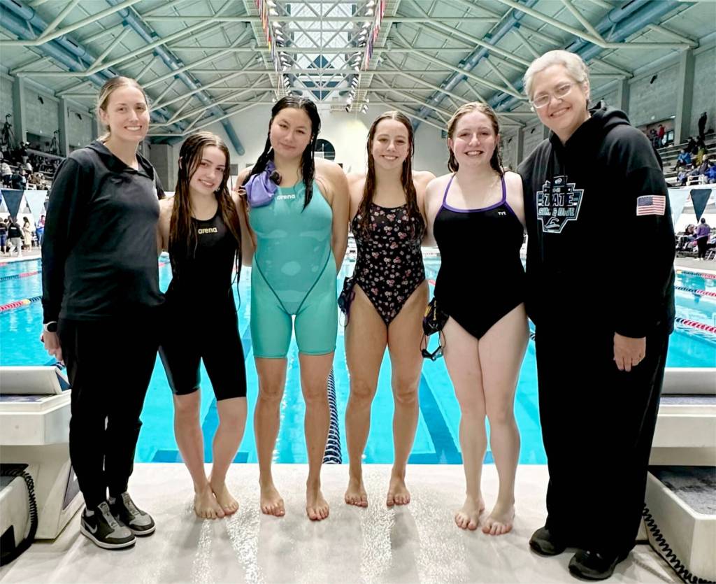 Sequim swimming 
The Sequim girls swim team placed 21st at the state 1A/2A championship. From left, are head coach Sarah Thorson, Ava Shinkle, Melia Nelson, Annie Ellefson, Keira Morey and coach Cherise Feser.
