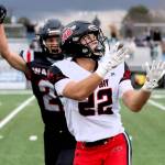 Neah Bays Adan Ellis reaches for a pass against Almire-Coulee-Hartline in the state 1B quarterfinals Saturday played in Moses Lake. Ellis had four catches for 85 yards in the 14-12 loss. (Roger Harnack/Cheney Free Press)