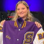 Photo courtesy Sarah Campbell/ Sequim High School junior Riley Campbell received a Letterman jacket on Nov. 9 for her years of service volunteering with the Wolf Pack youth football and cheer program. She started in the organization in kindergarten.