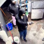Surveillance footage released by the Clallam County Sheriffs Office shows a suspect allegedly holding a Frugals employee at gunpoint on Thursday. (Clallam County Sheriffs Office)