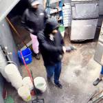 Surveillance footage released by the Clallam County Sheriffs Office shows a suspect allegedly holding a Frugals employee at gunpoint on Thursday. (Clallam County Sheriffs Office)