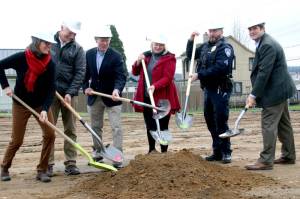 From left to right, donors Ann Soule and Dave Shreffler, Clallam County commissioner Randy Johnson, Peninsula Behavioral Health (PBH) CEO Wendy Sisk, PBH Board President Dave Arand and Port Angeles City Manager Nathan West break ground for PBHs new housing project, North View. Once completed next December, North View will have 36 units available to provide permanent, supportive housing for those who have experienced chronic homelessness. (Emma Maple/Peninsula Daily News)