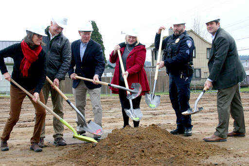 From left to right, donors Ann Soule and Dave Shreffler, Clallam County commissioner Randy Johnson, Peninsula Behavioral Health (PBH) CEO Wendy Sisk, PBH Board President Dave Arand and Port Angeles City Manager Nathan West break ground for PBHs new housing project, North View. Once completed next December, North View will have 36 units available to provide permanent, supportive housing for those who have experienced chronic homelessness. (Emma Maple/Peninsula Daily News)
