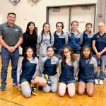 The Forks girls wrestling team finished second at The Prairie Open this weekend, beaten only by Yelm, a 4A school. From left, back row, are coach James Salazar, manager Moli Luong, Kinley Rondeau, Jade Blair, Riley Tjepkema, Alexis Koskela and Natalie Horejsi. From left, bottow row, are LaRayne Blair, Lilly Galeana, Flora Horejsi and Viviana Luna. (Forks High School)