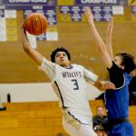 Sequims Solomon Sheppard attacks the rim during a 2023-24 contest against North Mason. (Michael Dashiell/Olympic Peninsula News Group)