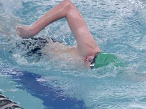 Port Angeles Isaac Meek powers to victory in the 200-yard freestyle, setting the first of two new personal bests in the Riders swim meet victory over Klahowya at Shore Aquatic Center.
