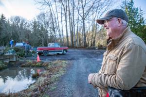 Lazy J Tree Farm owner Steve Johnson has lived his whole life on the farm and says he likes to tell people, I have the same telephone number I was born with. In the distance, people unload yard waste to be chopped into mulch or turned into compost. Christmas trees are received free of charge, regardless of where they were purchased. (Emily Matthiessen/Olympic Peninsula News Group)