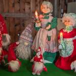 Animatronic Mrs. Clauses surrounded by Tomtens greet customers in the Lazy J Christmas Barn. Every year, a different selection of gently used Christmas items is offered, as well as tree stands and produce and apple cider. (Emily Matthiessen/Olympic Peninsula News Group)