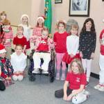 Jefferson Elementary School in Port Angeles designated Thursday dress up like a candy cane day. Back row, from left to right, they are: Wyatt Farman, Ari Ownby, Tayo Murdach, Chloe Brabant, Peyton Underwood, Lola Dixon, River Stella (in wheelchair), Fenja Garling, Tegan Brabant, Odessa Glaude, Eastyn Schmeddinger-Schneder. Front row: Ellie Schneddinger-Schneder, Cypress Crear, Bryn Christiansen and Evelyn Shrout. (Dave Logan/for Peninsula Daily News)