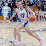 Sequims Hailey Wagner drives against Bellarine Select, a team from outside of Melbourne, Australia, on Monday in Sequim. Wagner had nine rebounds as Sequim played the Australians tough in a 54-52 loss. (Emily Matthiessen/Olympic Peninsula News Group)