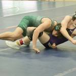 In a dual meet between Port Angeles and Sequim at the annual Battle of the Axe teams duals tournament, Port Angeles Drew Disher, left takes on Sequims Riley Downs in the 150-pound division. Disher won 22-7 and Port Angeles edged out a 33-29 win over the Wolves. (Dave Logan/for Peninsula Daily News)