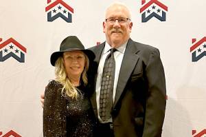 Kevin Russell, right, with his wife Niamh Prossor, after Russell was inducted into the Building Industry Association of Washingtons Hall of Fame in November.
