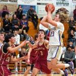Sequim's Zeke Schmadeke (23) goes up for a shot against Kingston on Friday. (Emily Matthiessen/Olympic Peninsula News Group)