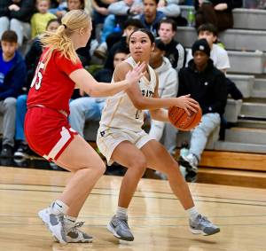 Jay Cline/Peninsula College Athletics 
Carliese OBrien shields the ball from Skagit Valleys Paige Mason while looking for a teammate during the Pirates 66-62 win over the Cardinals. Mason is a 2024 Port Angeles High School graduate.