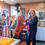 In her wet felting studio, Sequim artist Lora Armstrong explains how ruching happens in felt work. (Emily Matthiessen/Olympic Peninsula News Group)
