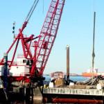 Black Ball Ferry Line is replacing the pilings on both sides of the slip that the MV Coho uses. The old pilings, which date to 1979, had deteriorated and needed to be replaced. The project will be completed before the Coho returns from its annual dry dock and engine maintenance in Anacortes. The ferry will resume its regular winter schedule on Feb. 19. (Dave Logan/for Peninsula Daily News)