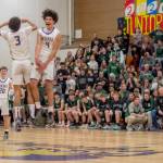 Emily Matthiessen/Olympic Peninsula News Group
Sequim's Jericho Julmist, right, and Solomon Sheppard celebrate the Wolves' come-from-behind victory over rival Port Angeles on Friday night.
