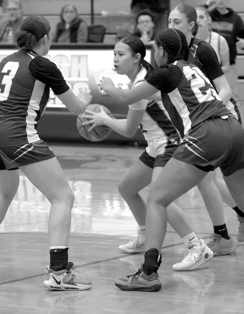 KEITH THORPE/PENINSULA DAILY NEWS
Port Angeles' Tatum Moses, center, is surrounded by Bremerton defenders, from left, Tiana Barber, Eulahn King and Siara Wilson on Friday at Port Angeles High School.
