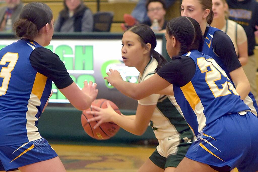 KEITH THORPE/PENINSULA DAILY NEWS
Port Angeles' Tatum Moses, center, is surrounded by Bremerton defenders, from left, Tiana Barber, Eulahn King and Siara Wilson on Friday at Port Angeles High School.
