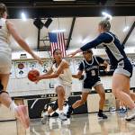 Jay Cline/Peninsula College Athletics 
Peninsula College's Carliese O'Brien drives the lane during the Pirates' 63-41 NWAC North Division victory over the Bellevue Bulldogs. Teammate Makena Patrick is at left.