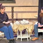 Anna Andersen, left, and Sean McDaniel, both of Port Angeles, rehearse for Enchanted April, a Port Angeles Community Players production that will be on stage through March 9.