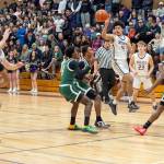 Emily Matthiessen/Olympic Peninsula News Group
Sequim sophomore Jericho Julmist puts up a 3-point shot during the Wolves' 76-50 Class 2A West Central District Boys Basketball Tournament victory Wednesday at Rick Kaps Gym.