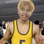 Forks' Abraham Montealegre celebrates his state championship at 110 pounds at the Tacoma Dome on Saturday. Montealegre is part of a long line of Forks state champions in wrestling. (Courtesy of Kyle Weakley)